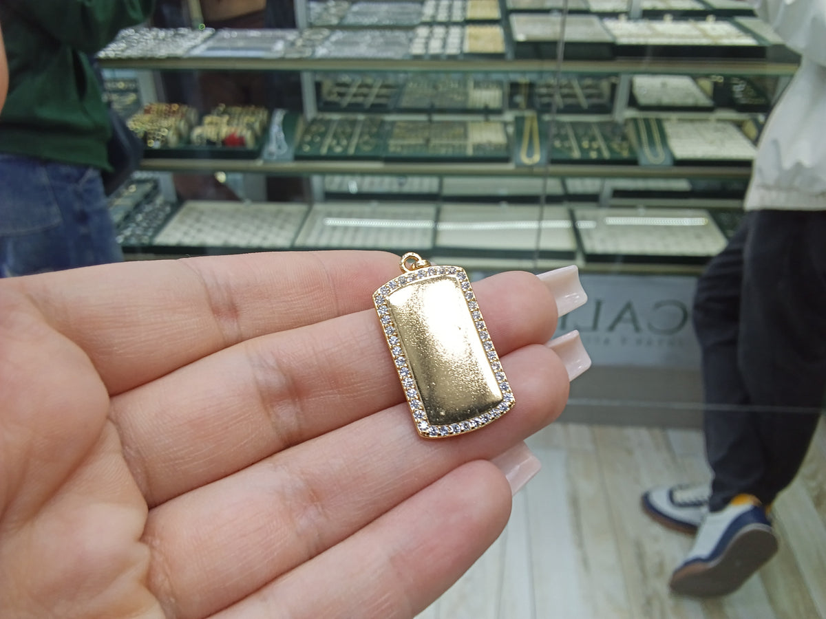Dije placa con zircón OL