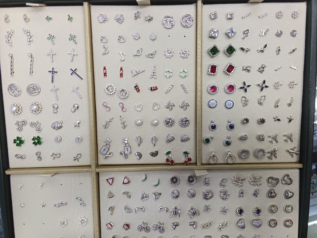 Topos en plata surtidos (27)